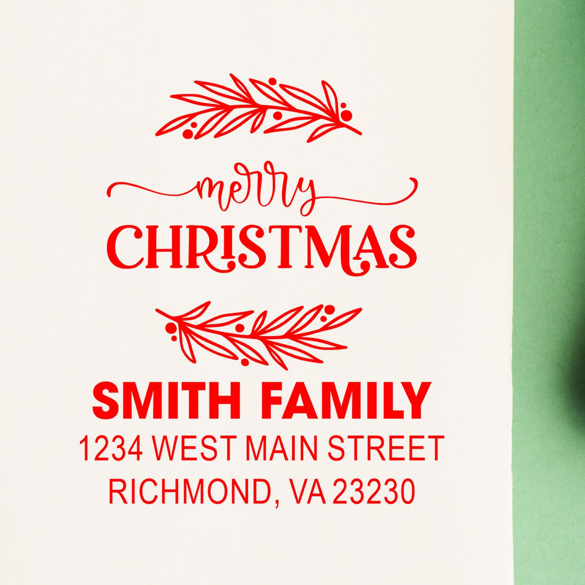 Personalized Christmas address rubber stamp for Smith Family, with Merry Christmas and floral accents, Richmond, VA 23230.