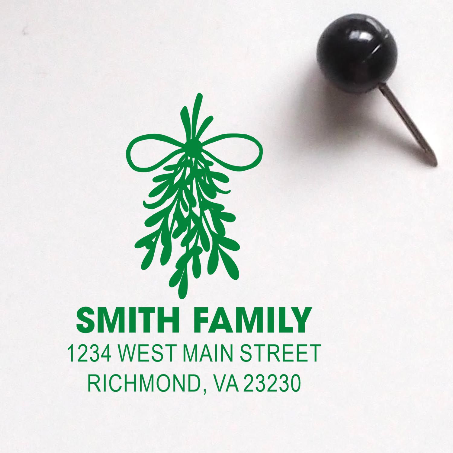 Custom return address rubber stamp with mistletoe design for Smith Family, Richmond VA 23230.