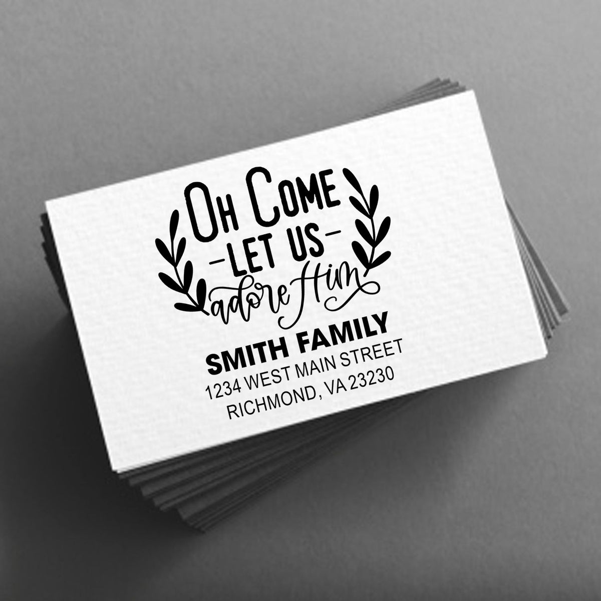 Personalized holiday rubber stamp with Oh Come Let Us Adore Him design and Smith family return address.