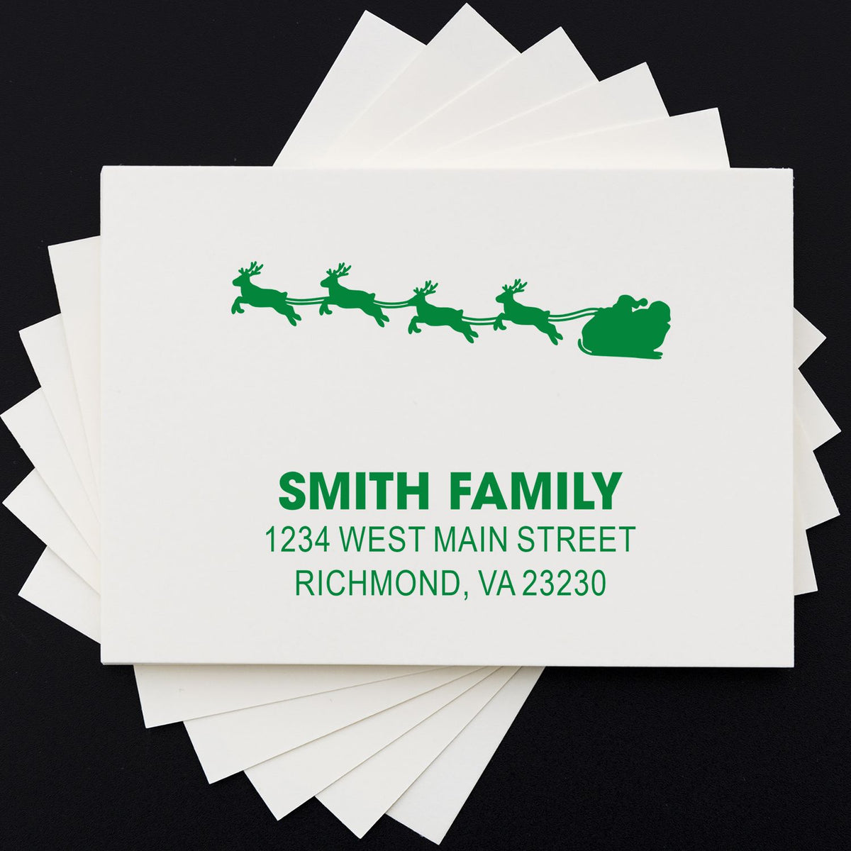 Custom Christmas return address rubber stamp with Santa sleigh and reindeer, personalized Smith Family holiday mailing stamp.
