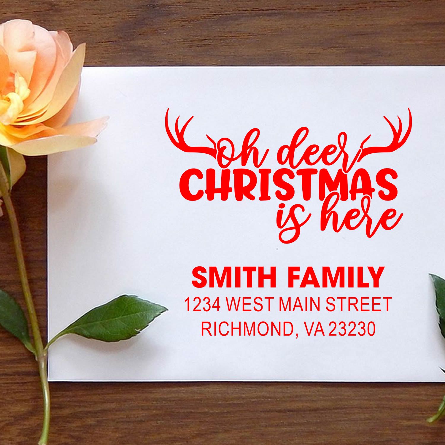 Personalized Christmas address stamp with deer antlers and Oh deer Christmas is here for holiday cards and envelopes.