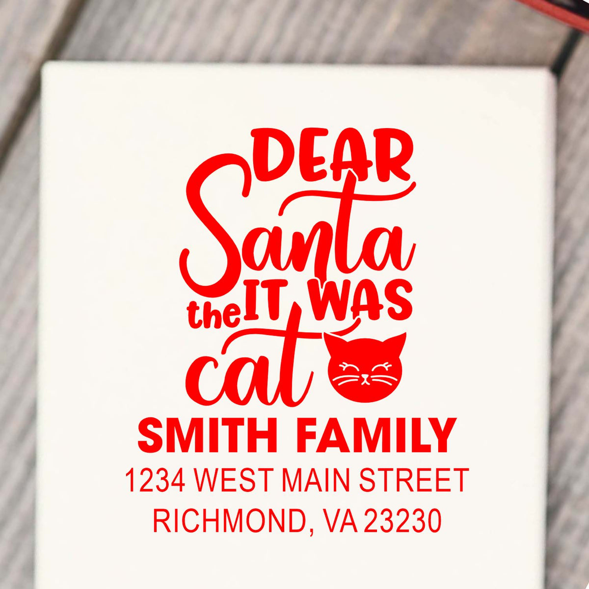 Custom Christmas rubber stamp with Dear Santa, it was the cat cat design and Smith Family return address.