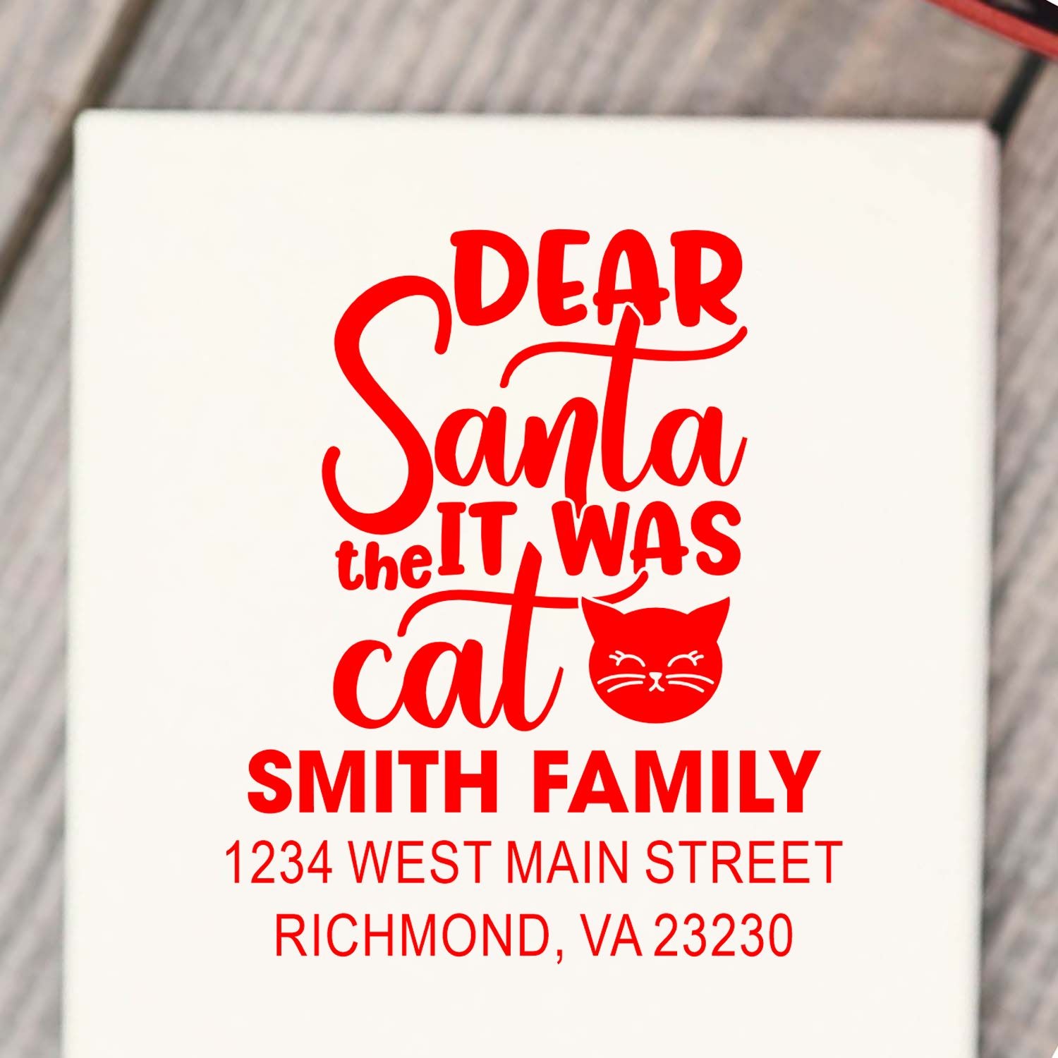 Personalized rubber stamp design for holiday cards: Dear Santa, it was the cat with Smith Family address.