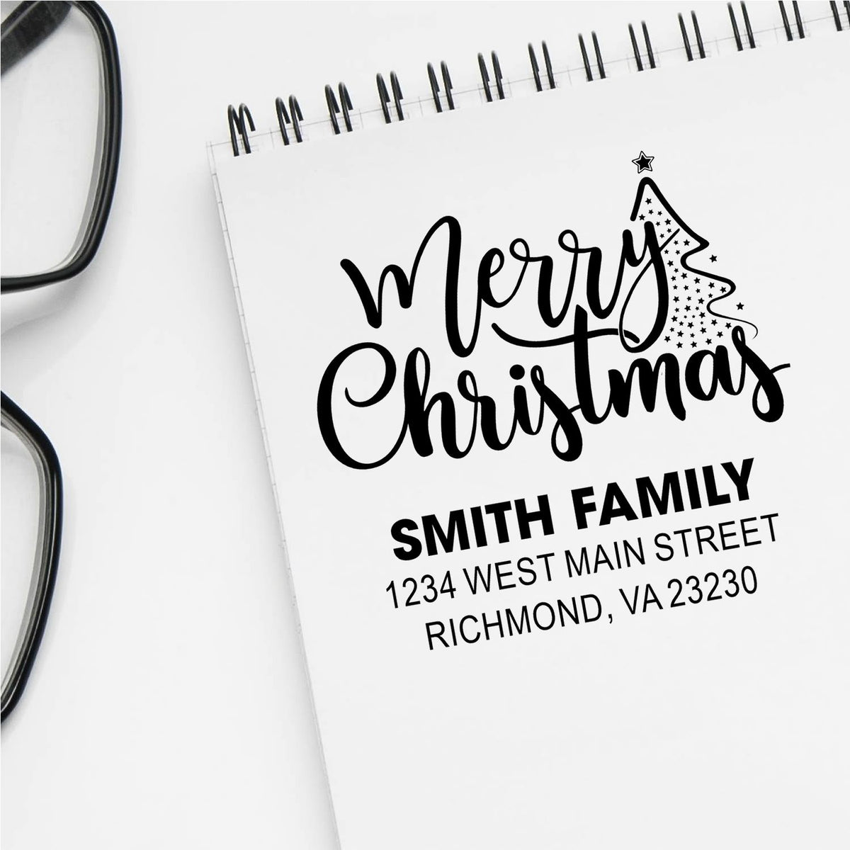 Custom Merry Christmas return address rubber stamp for holiday cards, featuring family name and address