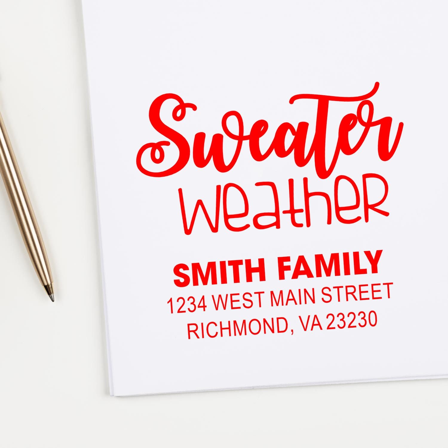 Custom rubber stamp design with Sweater Weather and Smith family address for personalized holiday stationery.
