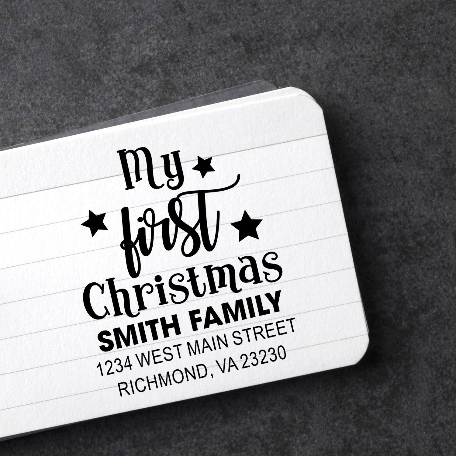 Custom My First Christmas rubber stamp with family name and return address for holiday cards and gift tags.