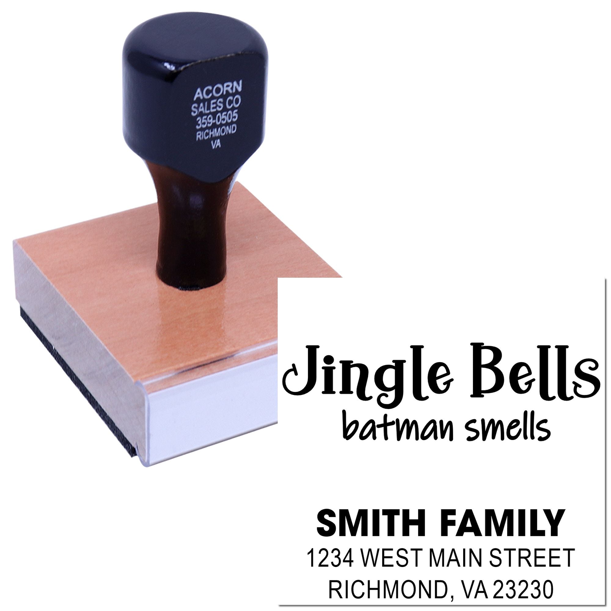 Custom rubber stamp showing holiday message and personalized address imprint for family mailing needs.