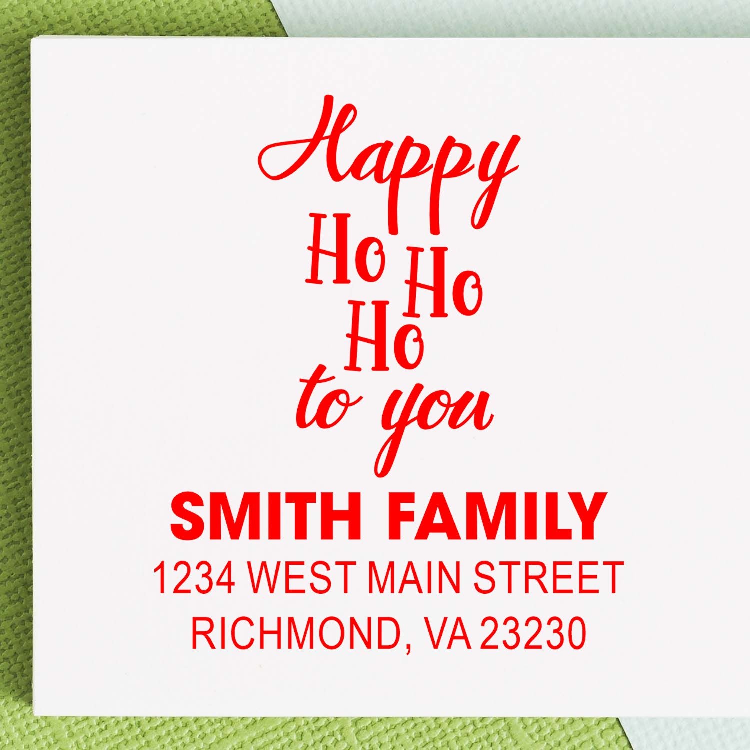 Holiday return address rubber stamp with Happy Ho Ho Ho to you and Smith family name.