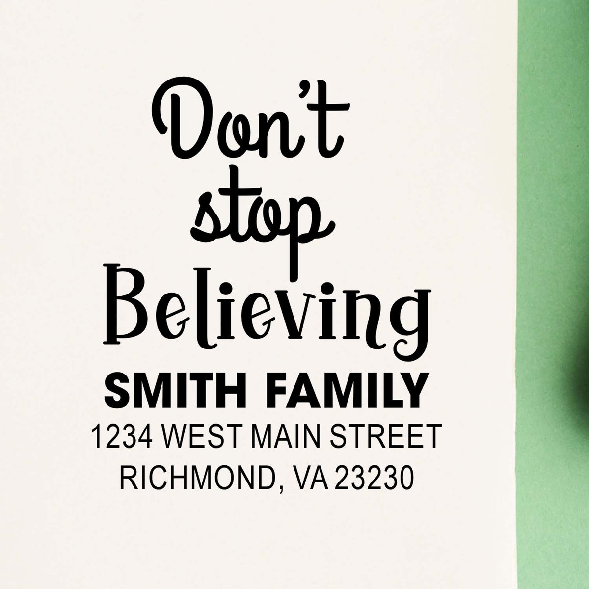 Personalized rubber stamp with Dont stop believing, Smith family name, and custom return address in Richmond, VA.