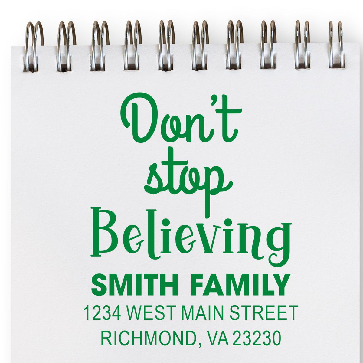 Custom rubber stamp design with Dont Stop Believing and Smith Family return address for personalized mailing.