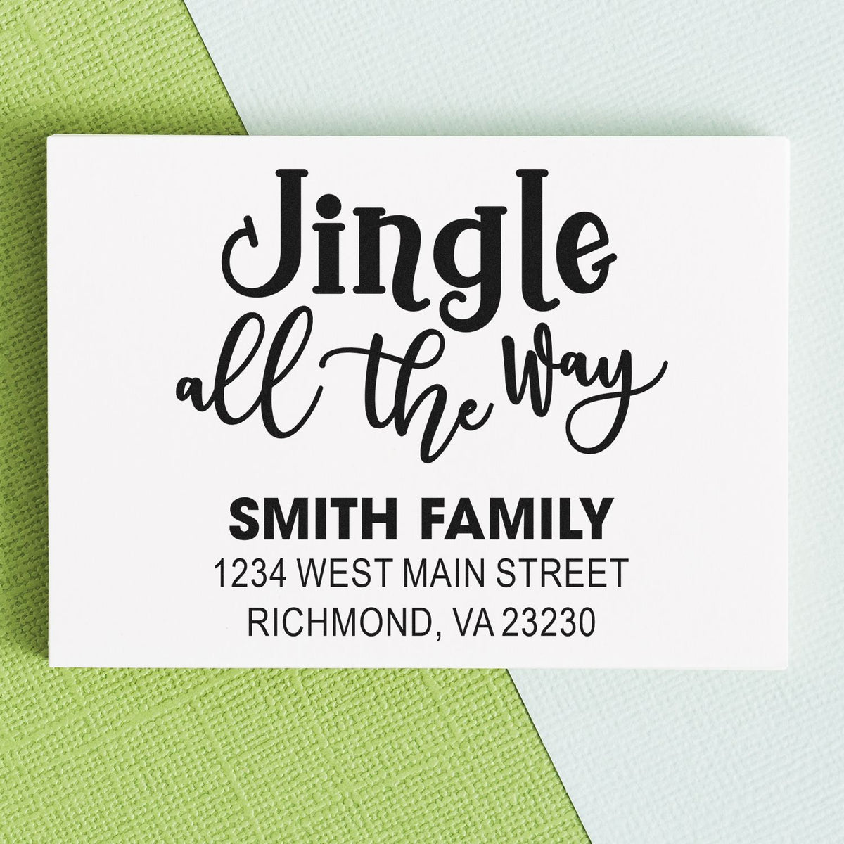 Custom holiday return address rubber stamp with Jingle all the Way and Smith Family address for Christmas mailings.