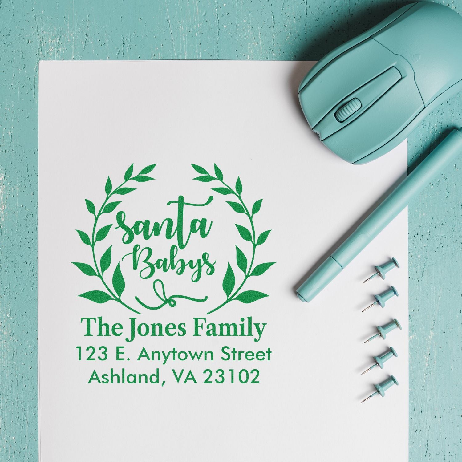 Personalized holiday rubber stamp with wreath design for Santa Baby's return address, The Jones Family, Ashland, VA.