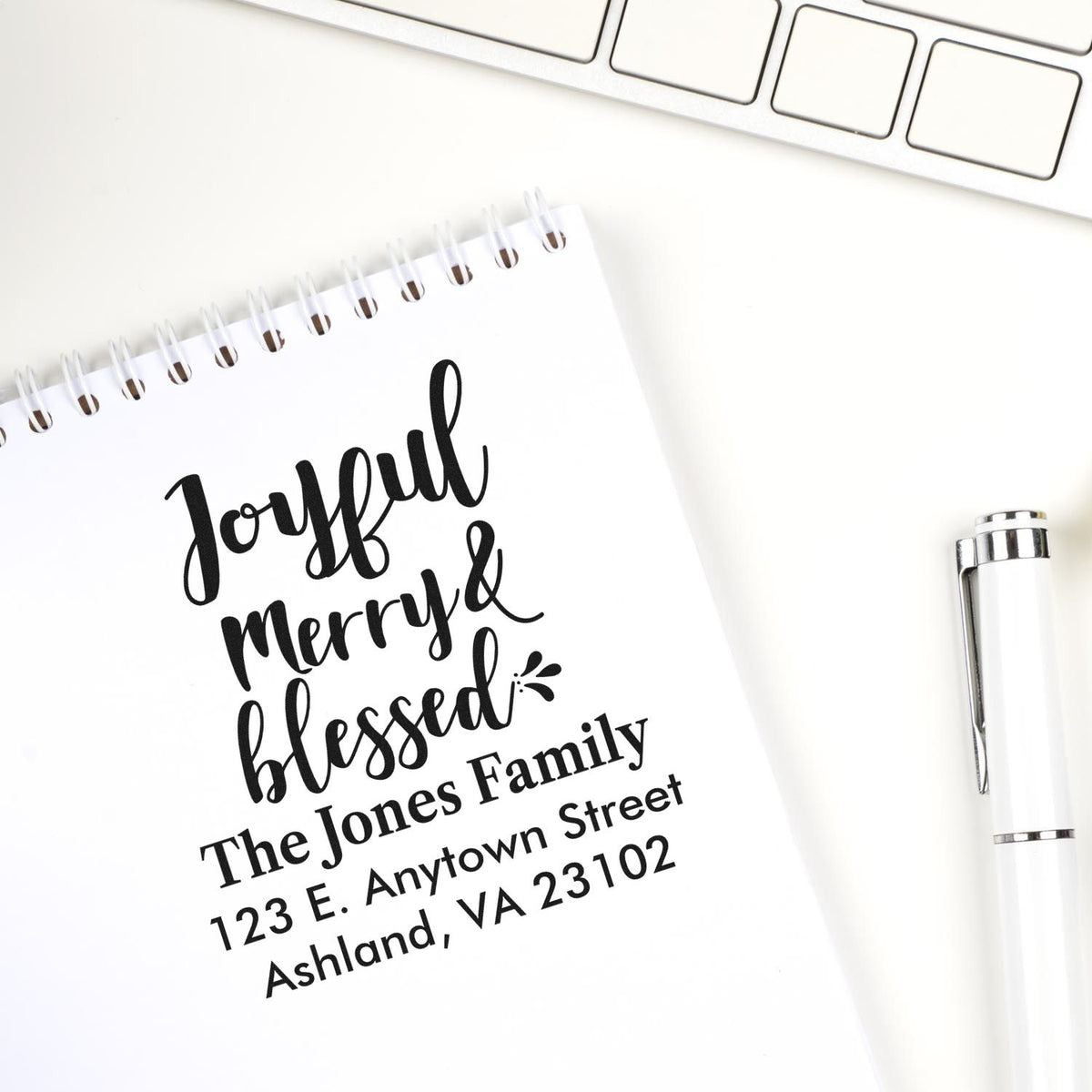 Custom holiday rubber stamp with Joyful Merry & Blessed and return address for festive cards.