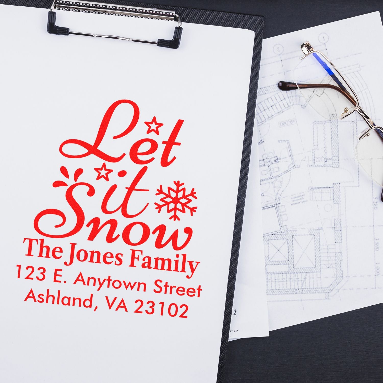 Custom rubber stamp address stamp reading Let It Snow for The Jones Family, ideal for holiday cards and stationery.
