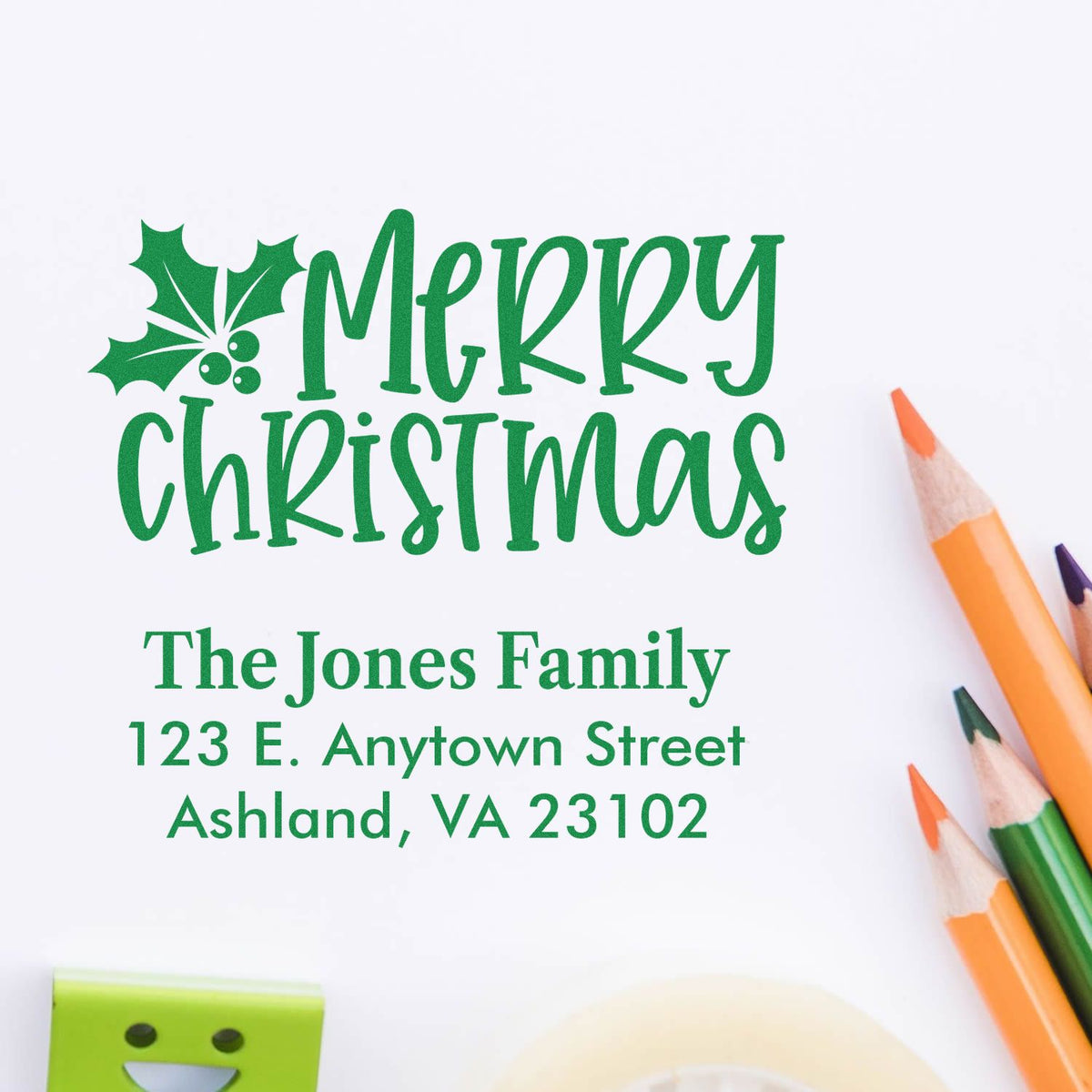 Personalized Merry Christmas return address rubber stamp with holly, featuring The Jones Family for holiday cards.