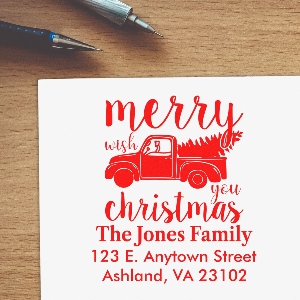 Personalized Christmas return address rubber stamp with merry truck design for The Jones Family, Ashland, VA.