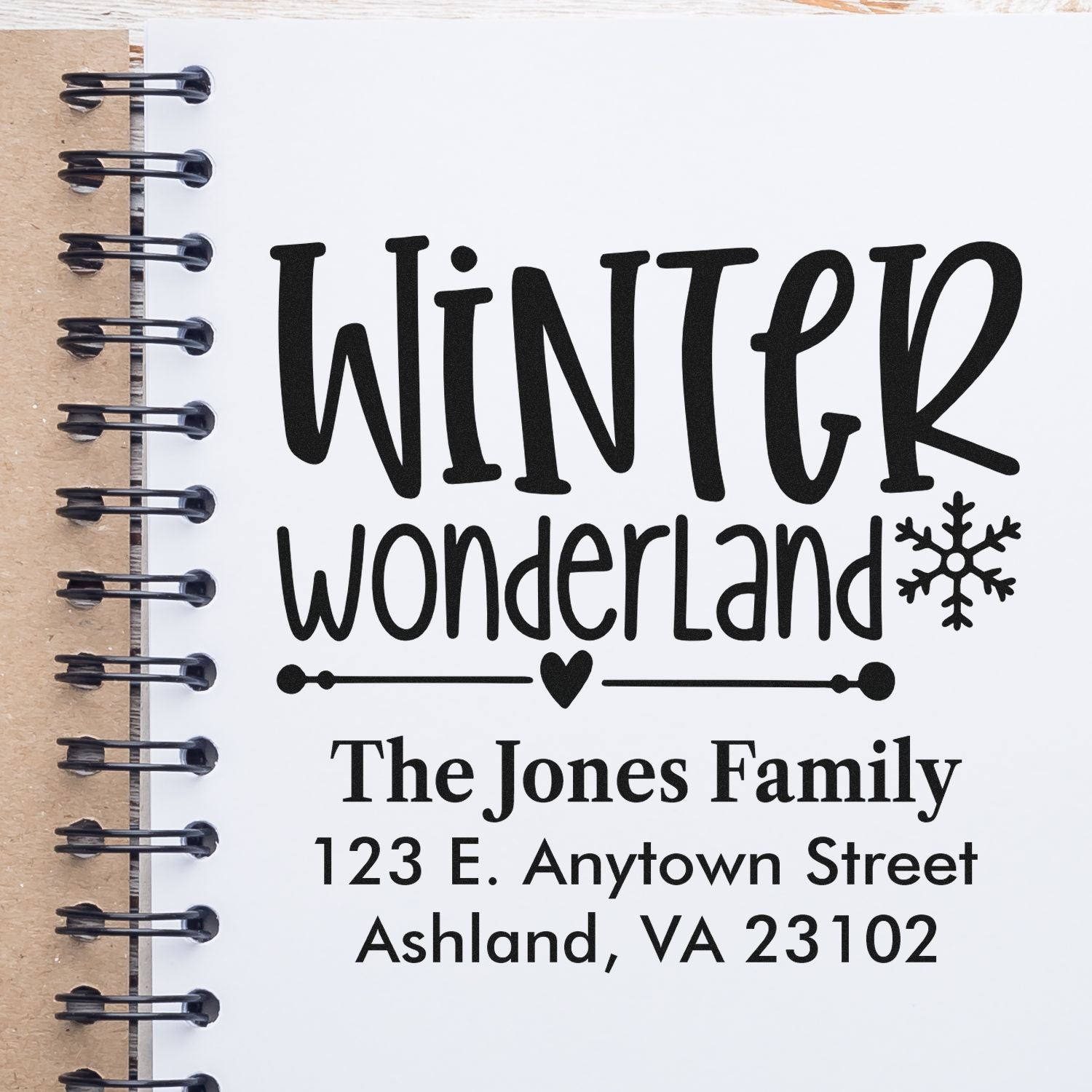 Personalized winter rubber stamp design with Winter Wonderland and The Jones Family address for holiday mailings