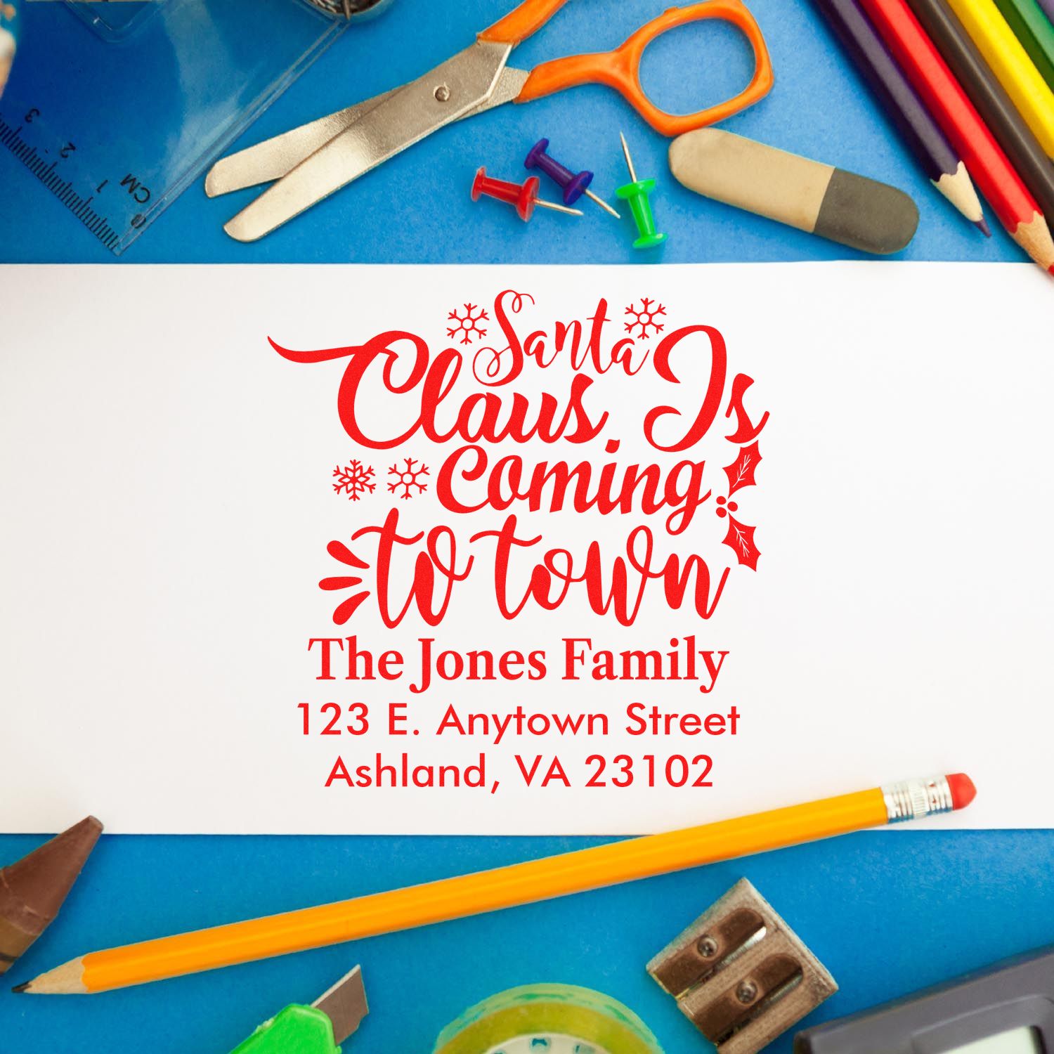 Personalized Christmas address rubber stamp reading Santa Claus Is Coming to Town for holiday cards and mailings