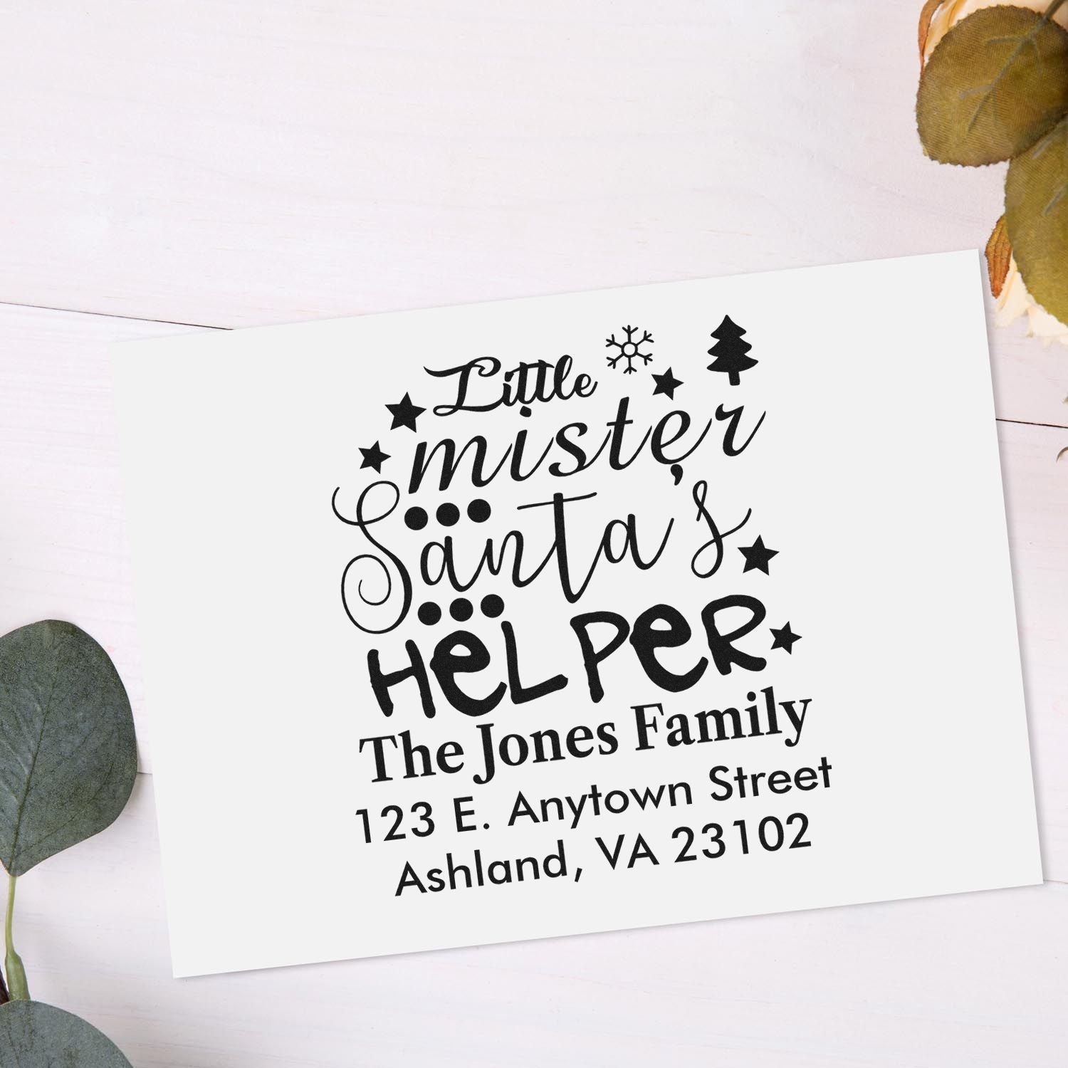 Personalized holiday return address rubber stamp for Little Mister Santas Helper family name and address.