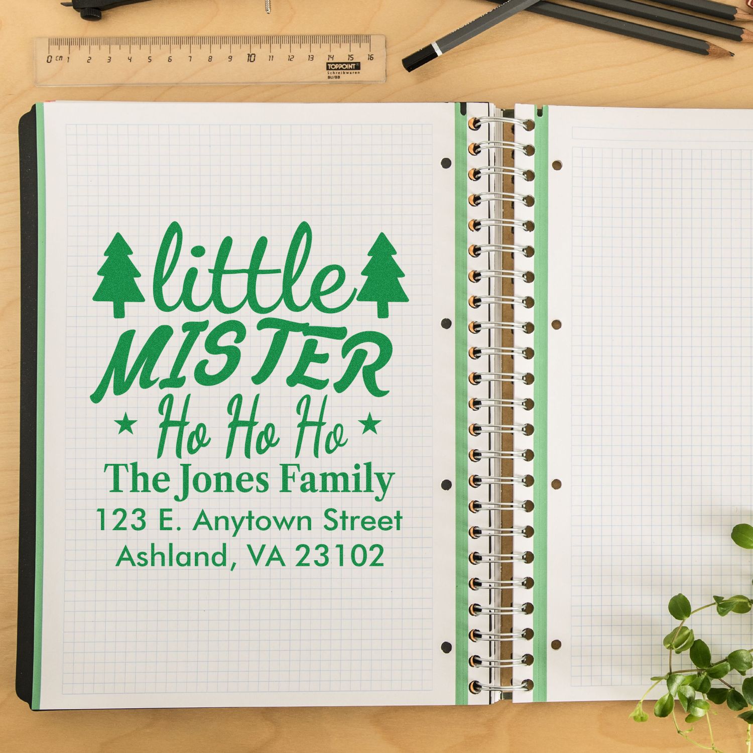 Custom return address rubber stamp for The Jones Family with little MISTER holiday design, Christmas trees, and Ho Ho Ho text.