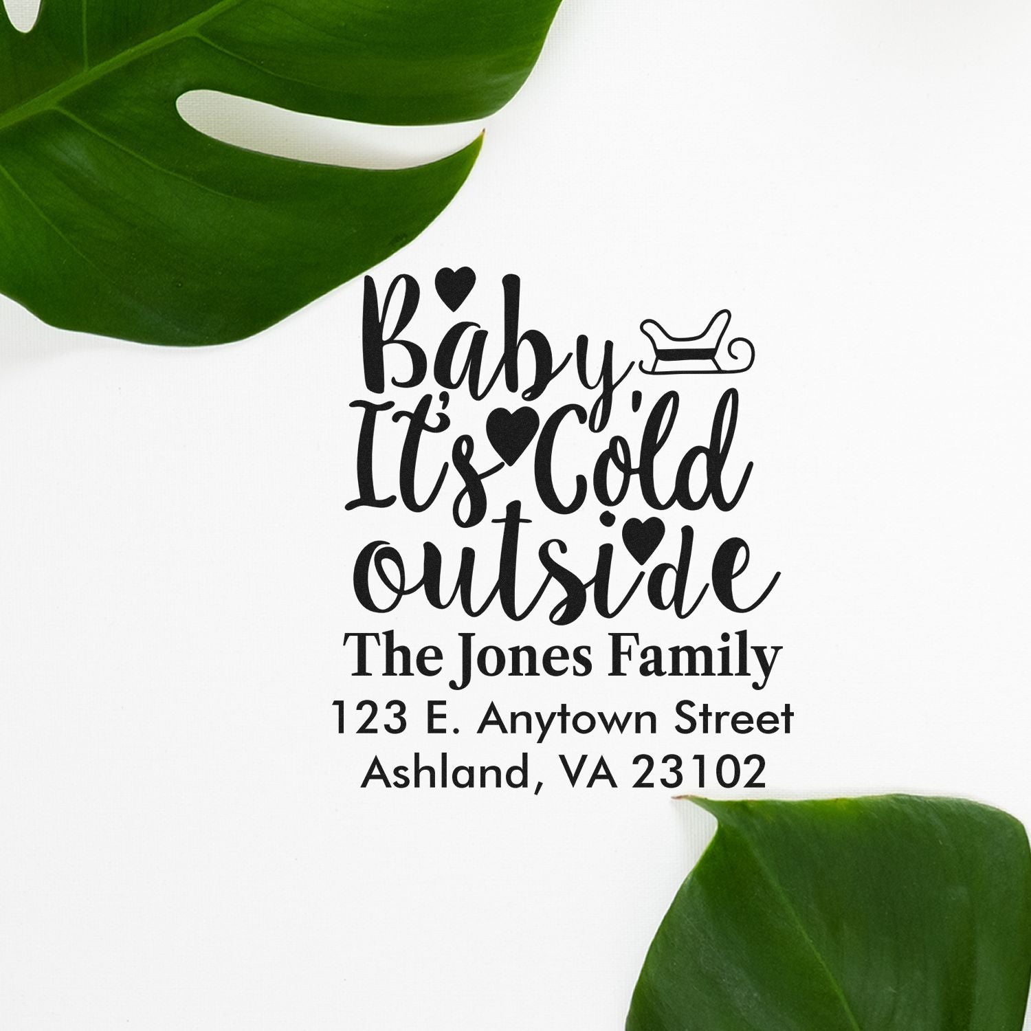 Personalized rubber stamp with Baby Its Cold Outside design, family name, and address for winter holiday mailings.