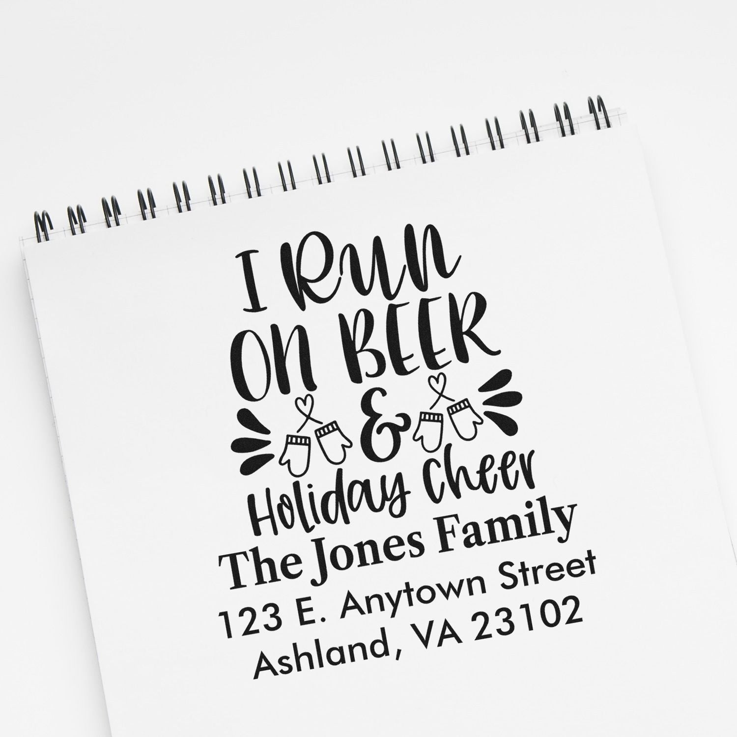Custom holiday address rubber stamp with I Run on Beer & Holiday Cheer, family name, and return address.