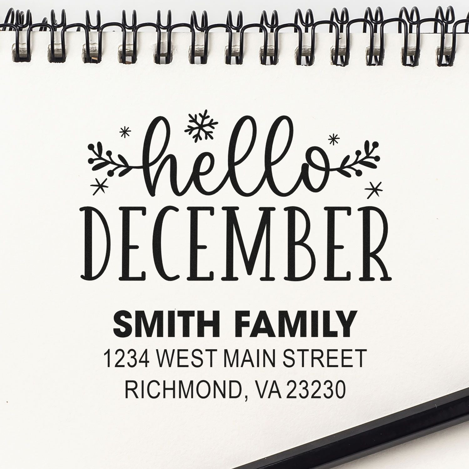 Custom holiday rubber stamp design with Hello December and Smith Family address for festive cards and mailings.