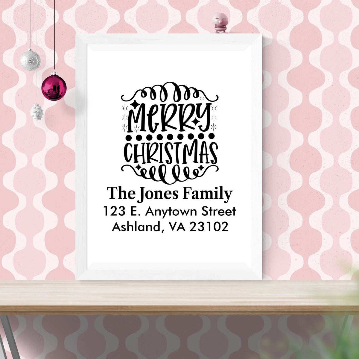 Custom Merry Christmas return address rubber stamp with family name and address for holiday cards and festive mailings.