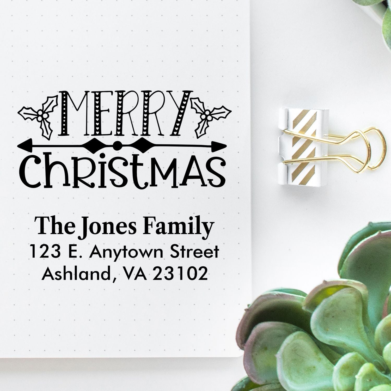 Custom Merry Christmas return address rubber stamp with family name and address for holiday card envelopes.