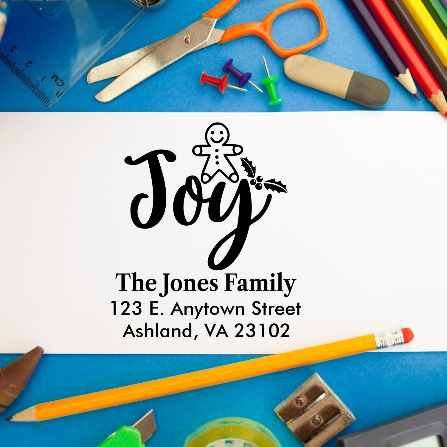 Personalized holiday return address rubber stamp with Joy design for Christmas cards, featuring The Jones Family address.