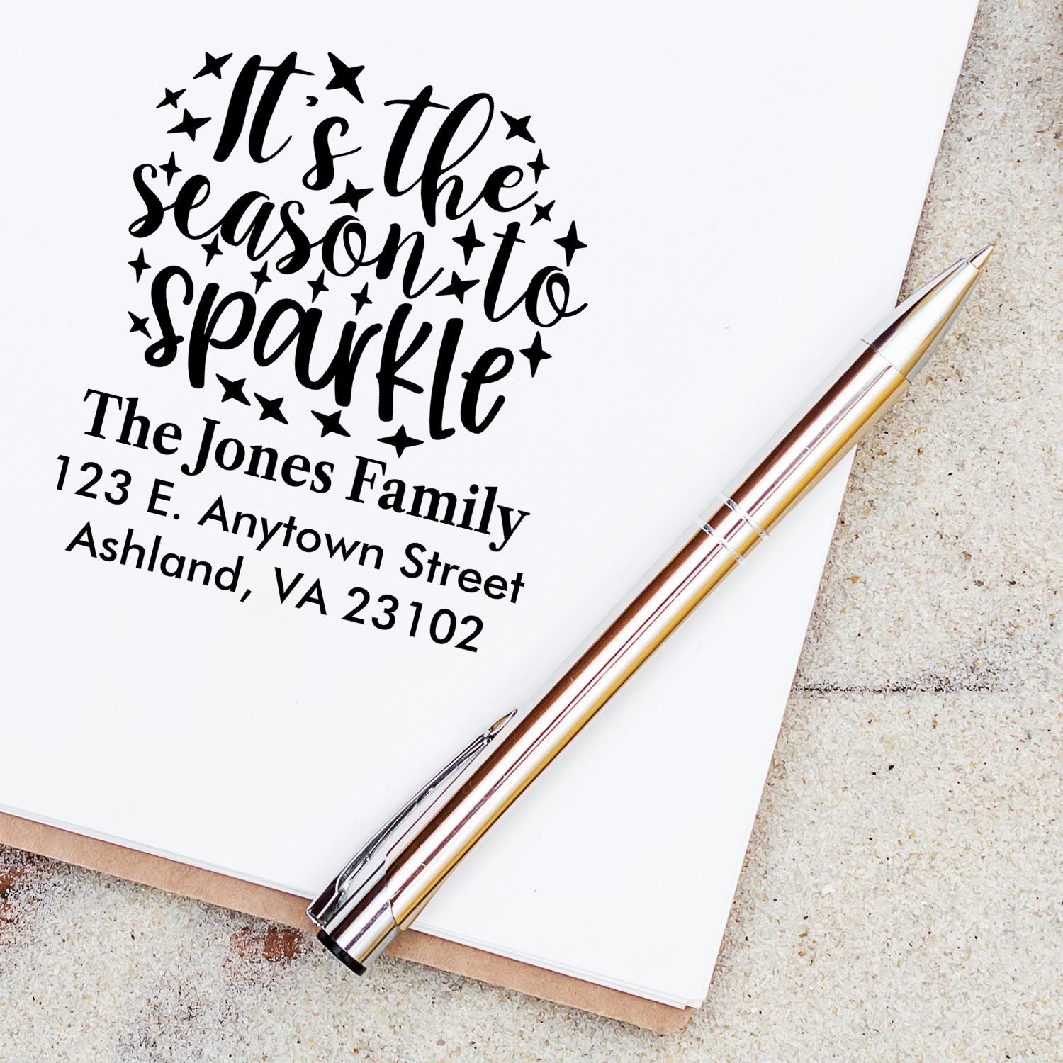 Custom rubber stamp with Its the season to sparkle and The Jones Family address for holiday cards.