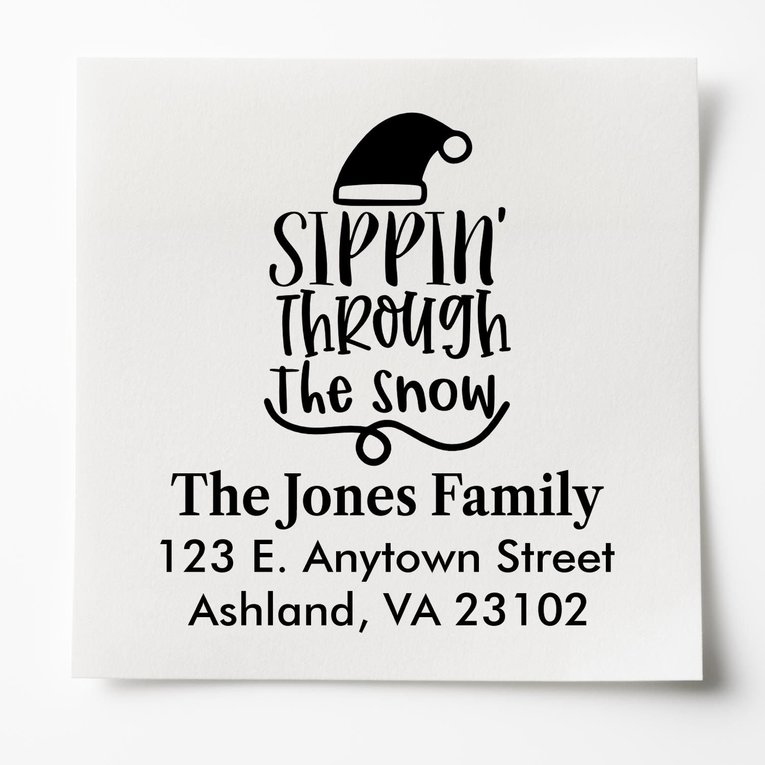Custom rubber address stamp with Sippin Through the Snow Santa hat design for holiday cards and return mail.