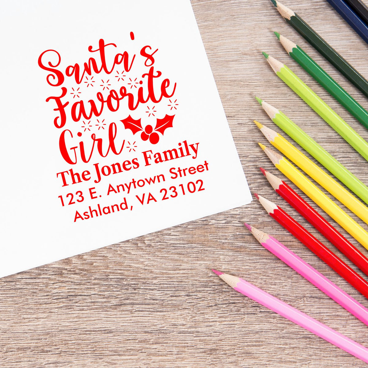 Custom holiday rubber stamp with Santas Favorite Girl design and return address for Christmas card mailings.