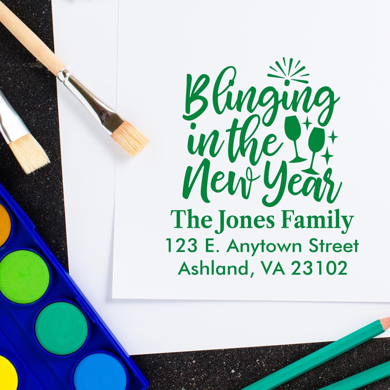 Custom New Year rubber stamp design with Blinging in the New Year, family name, and return address for holiday cards.