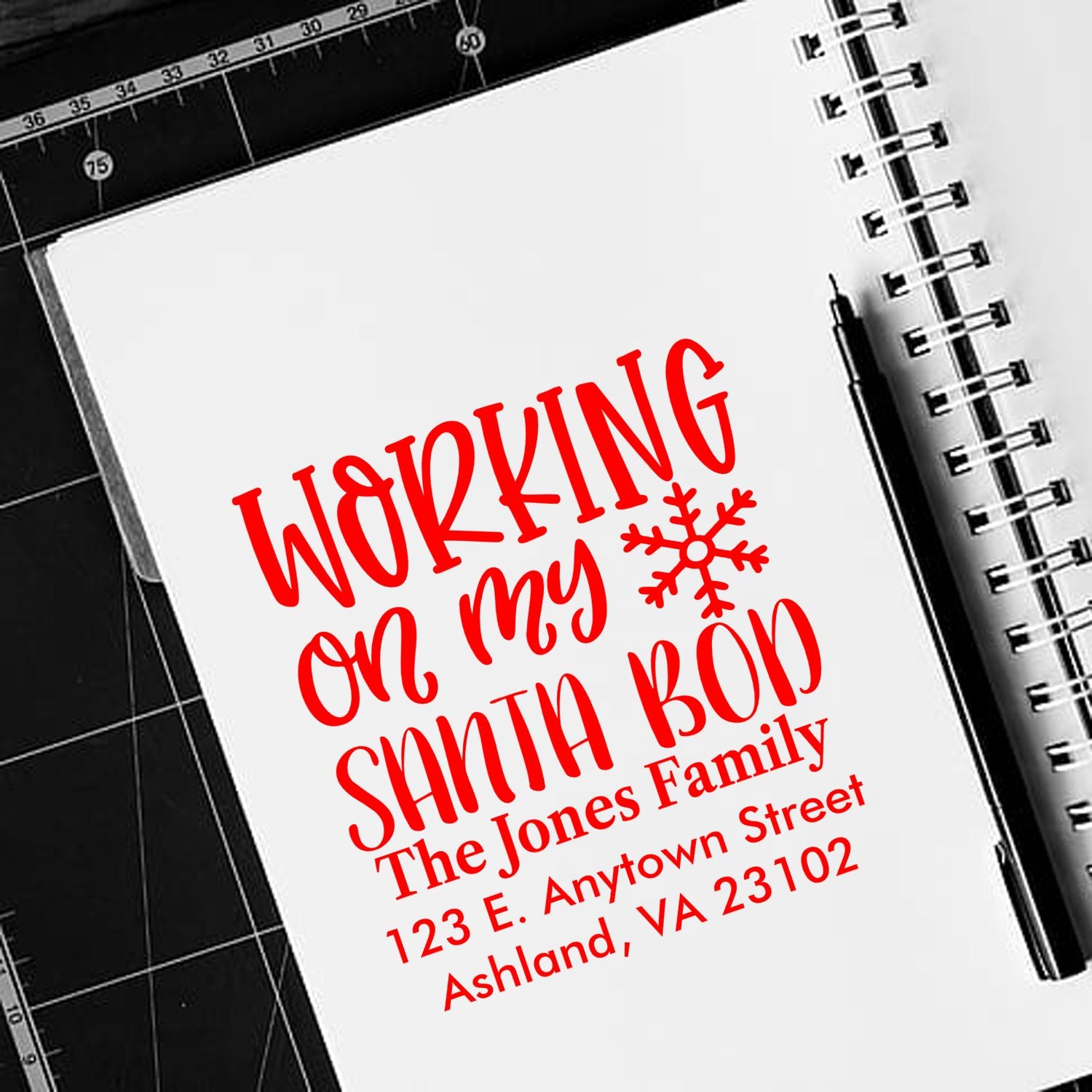 Personalized rubber stamp design reading Working on My Santa Bod with family return address for holiday cards and mail.
