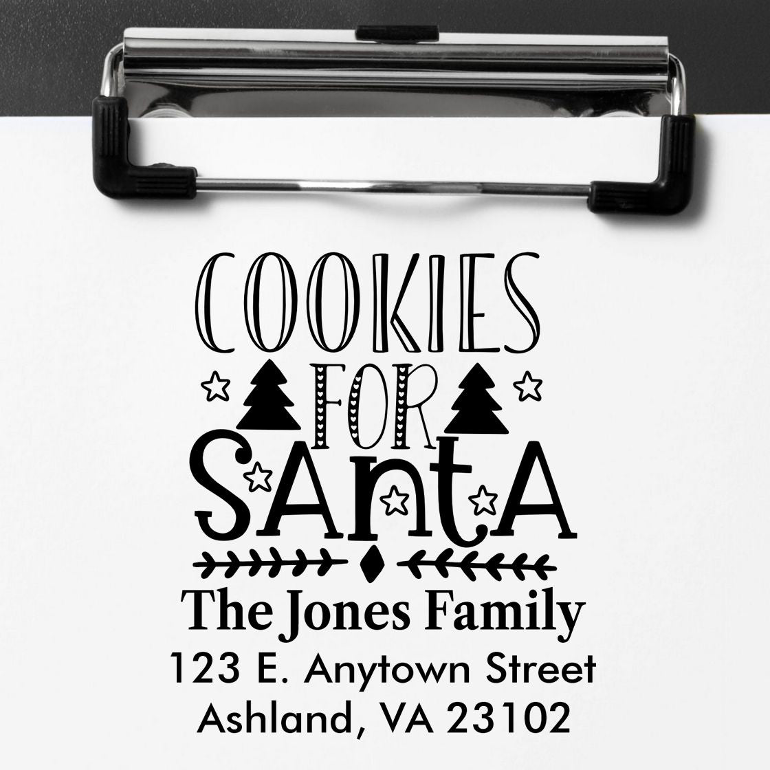 Personalized holiday rubber stamp design for Cookies for Santa, featuring family name and return address.
