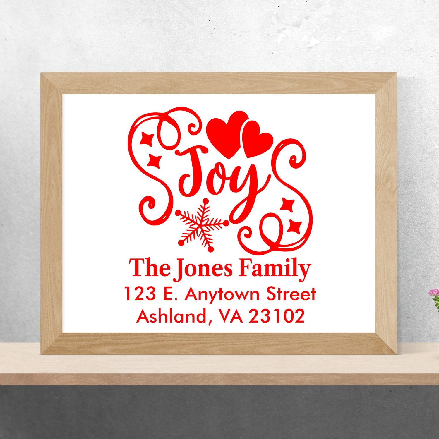Custom holiday return address rubber stamp design with Joy, hearts, snowflake, and personalized family address.