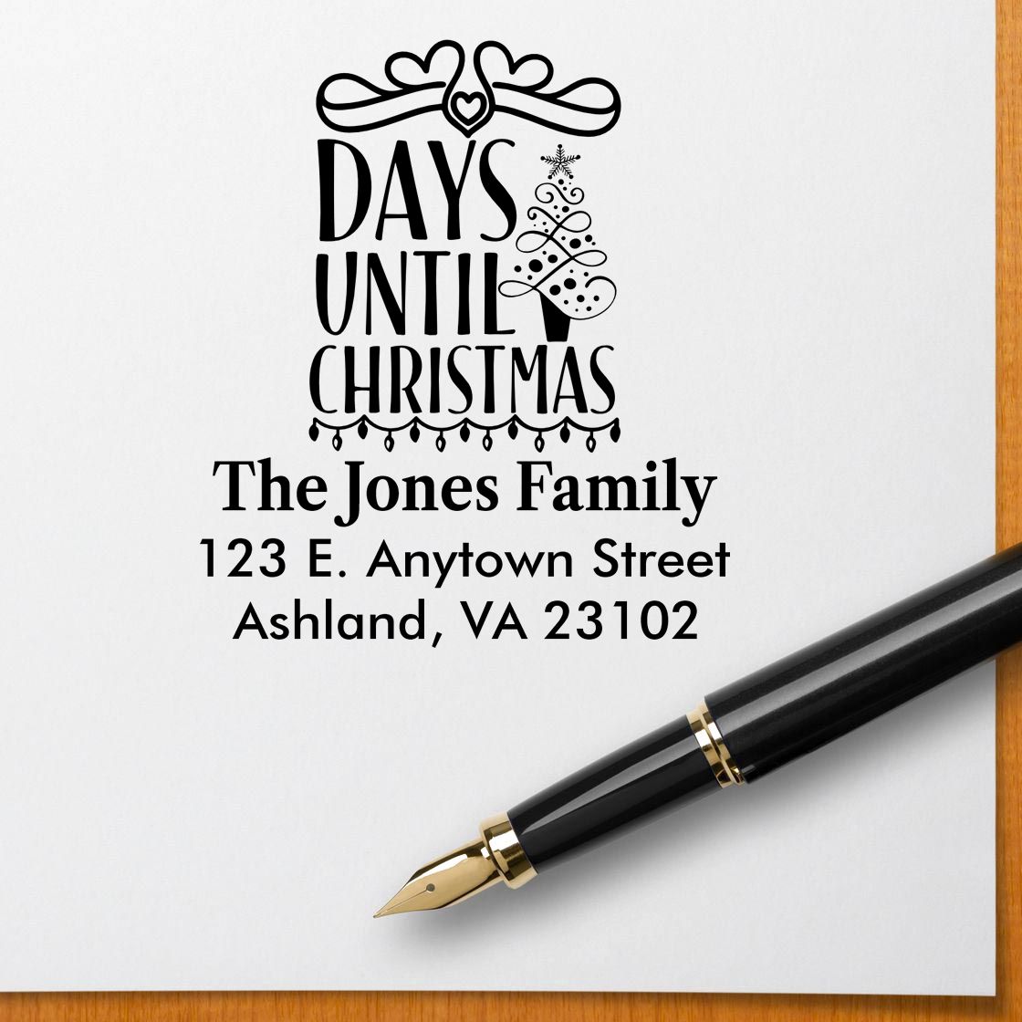 Custom Christmas rubber stamp with Days Until Christmas design, family name, and return address for holiday cards and envelopes.