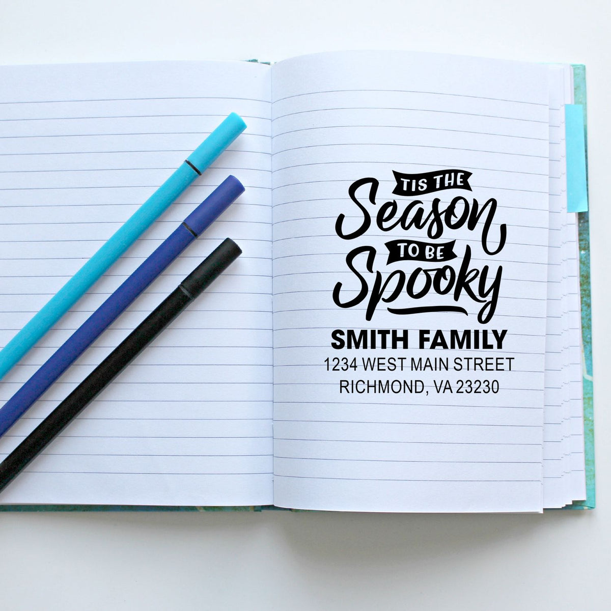 Personalized address rubber stamp sample with Tis the Season to Be Spooky design, Smith Family name, and Richmond, VA address.