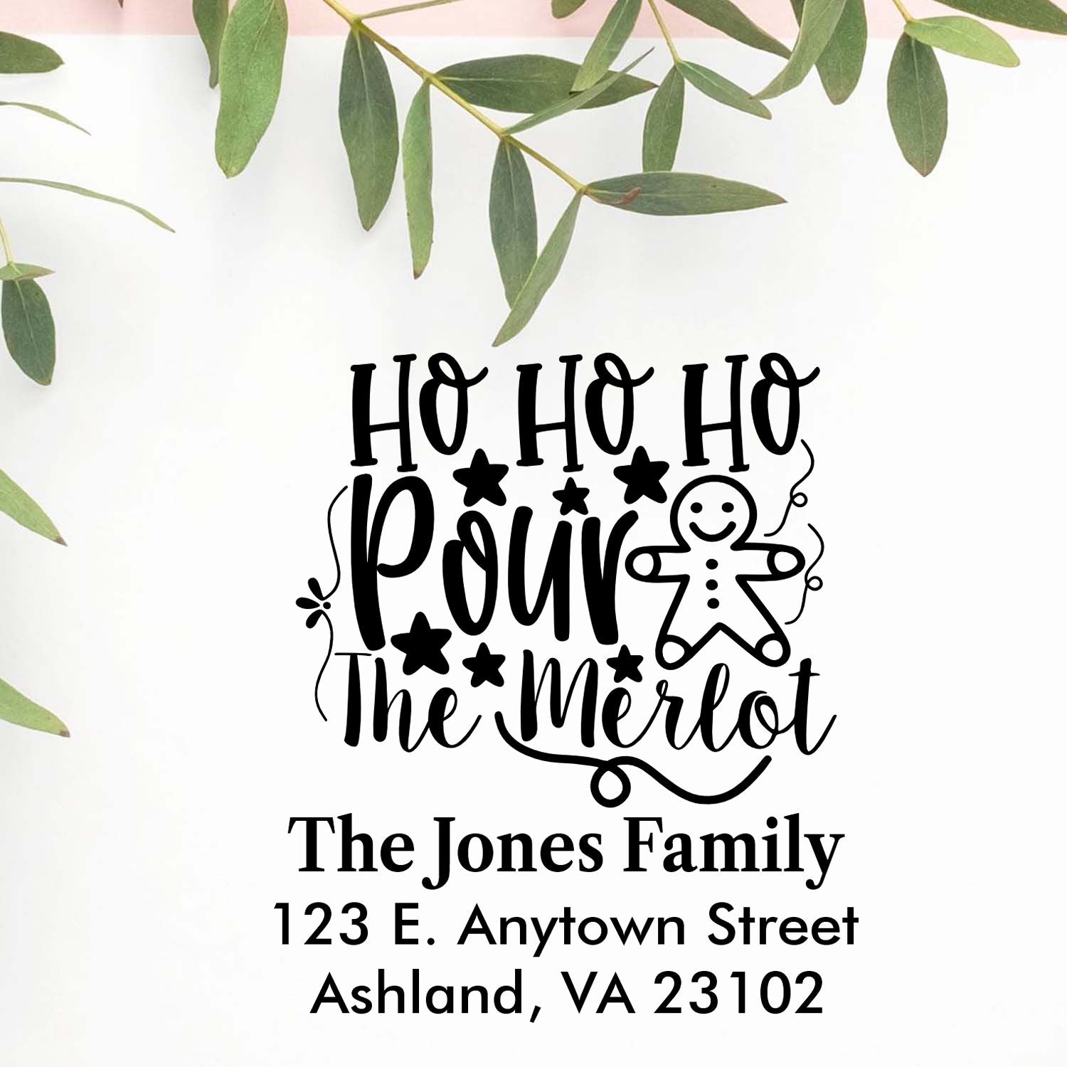 Custom holiday rubber stamp with Ho Ho Ho Pour the Merlot design and personalized family address for festive wine gifts.