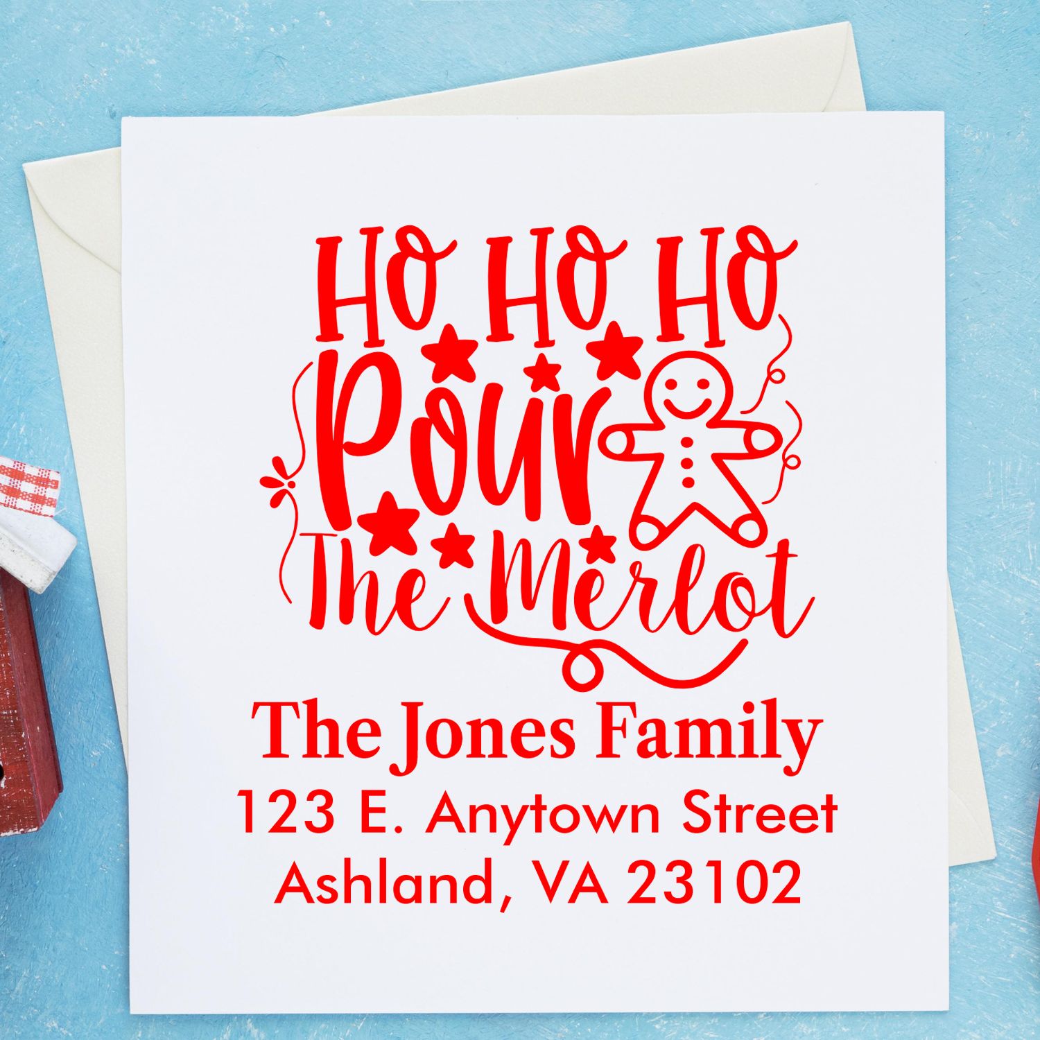 Custom Christmas address rubber stamp for holiday cards featuring Ho Ho Ho, Pour the Merlot and The Jones Family.