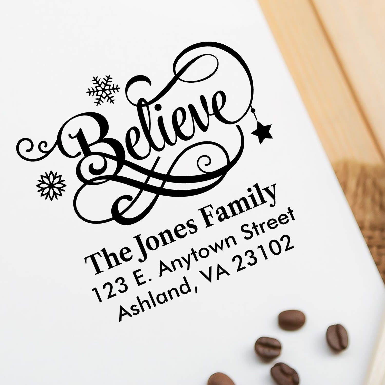 Custom Believe family address rubber stamp with decorative script for holiday cards, crafts, and personalized mail.