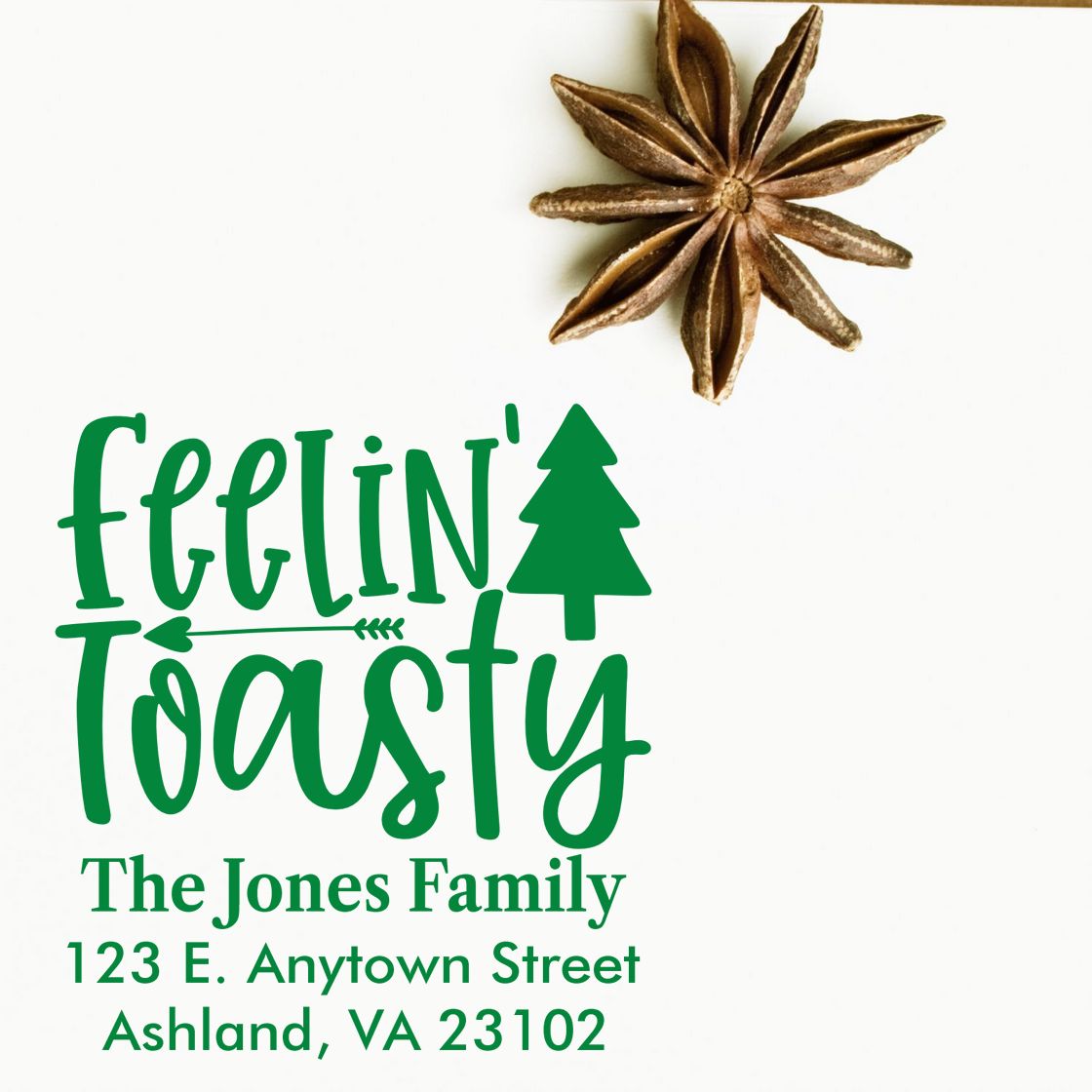 Personalized rubber stamp with Feelin Toasty holiday design and family return address for The Jones Family in Ashland, VA.