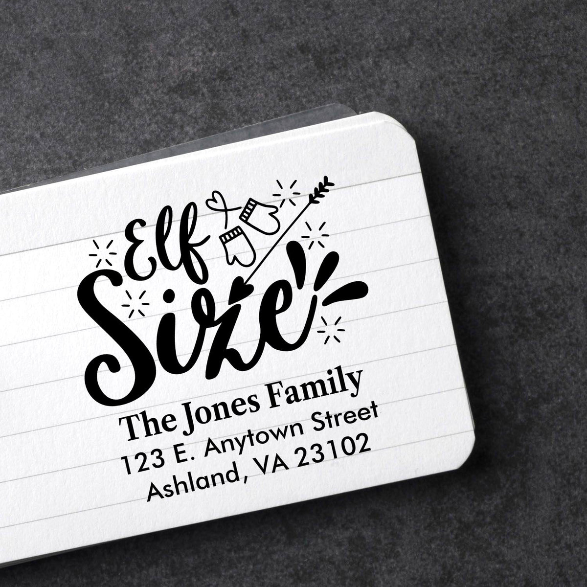 Custom Elf Sire return address rubber stamp for holiday cards, featuring The Jones Family name and address.
