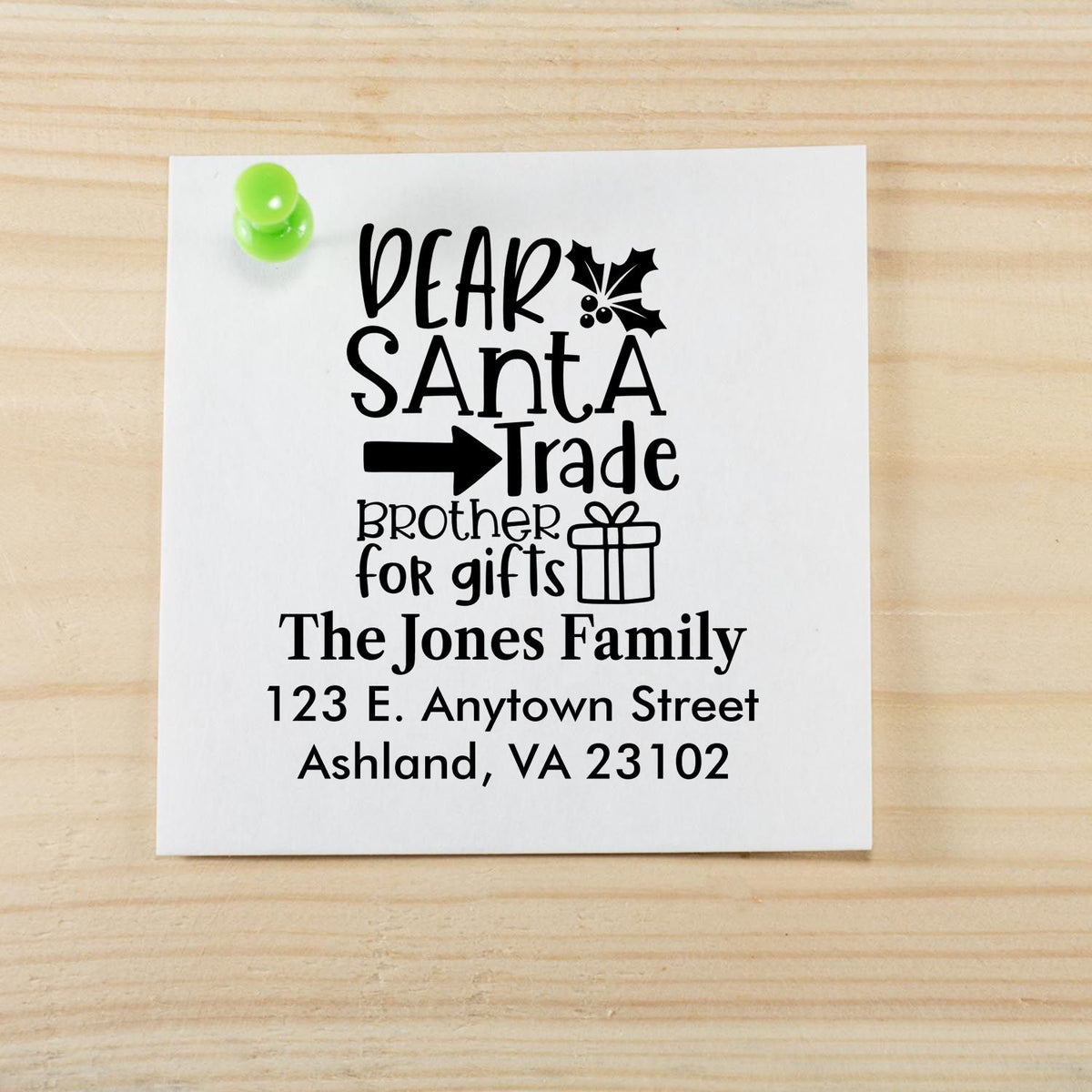 Custom Christmas rubber stamp for Santa trade brother for gifts, with The Jones Family return address.