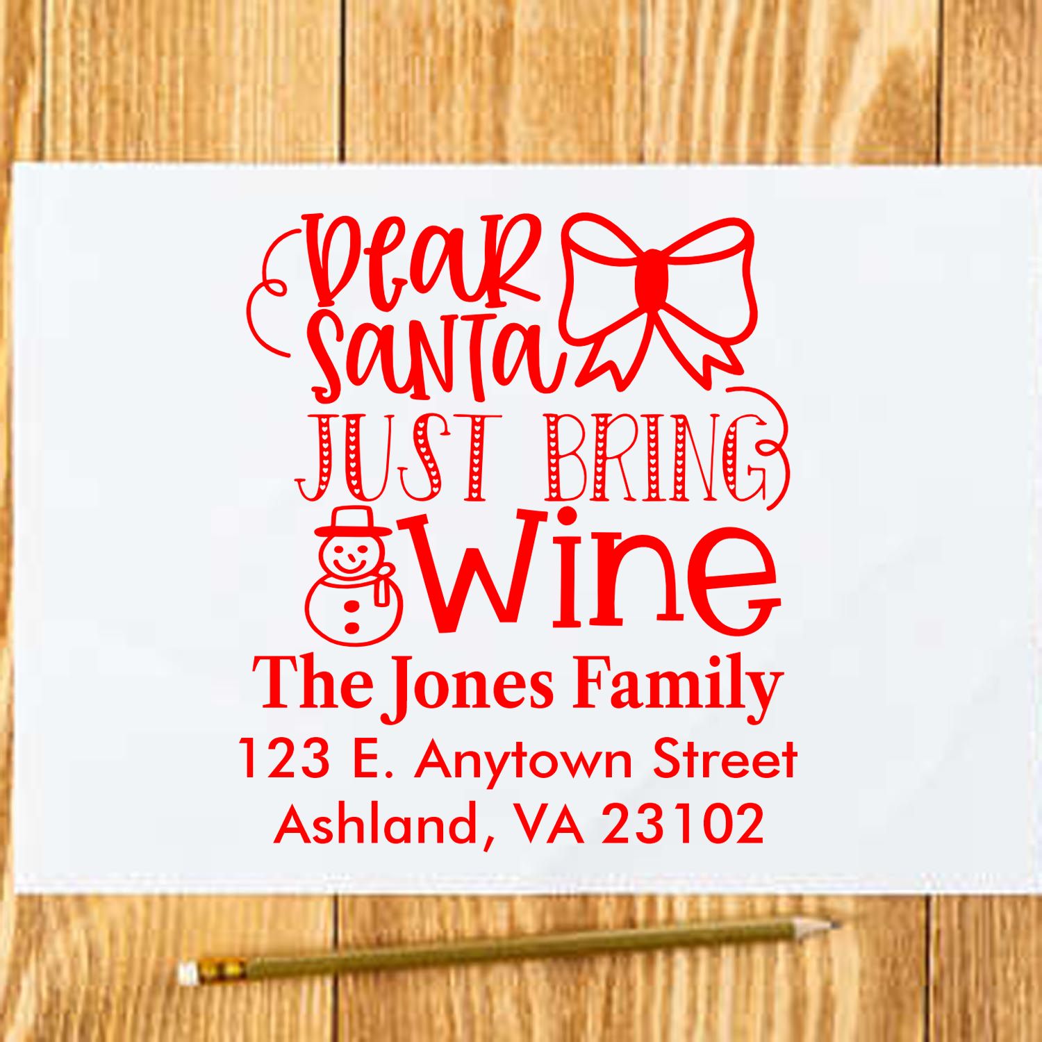 Custom Christmas rubber stamp with Dear Santa Just Bring Wine design, family name, and return address for holiday cards.