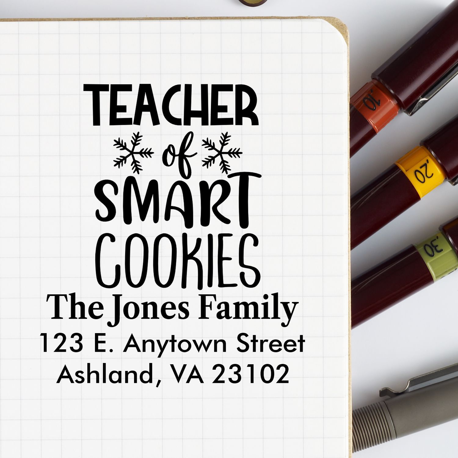Personalized teacher rubber stamp with Teacher of Smart Cookies and custom return address for classroom mail.