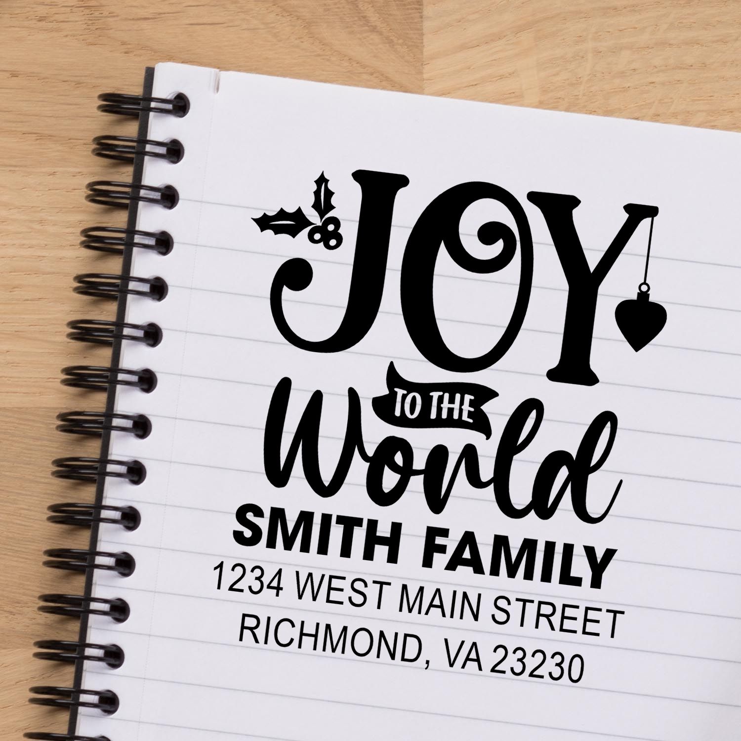 Personalized holiday rubber stamp mockup with Joy to the World, Smith family name, and Richmond, VA address.