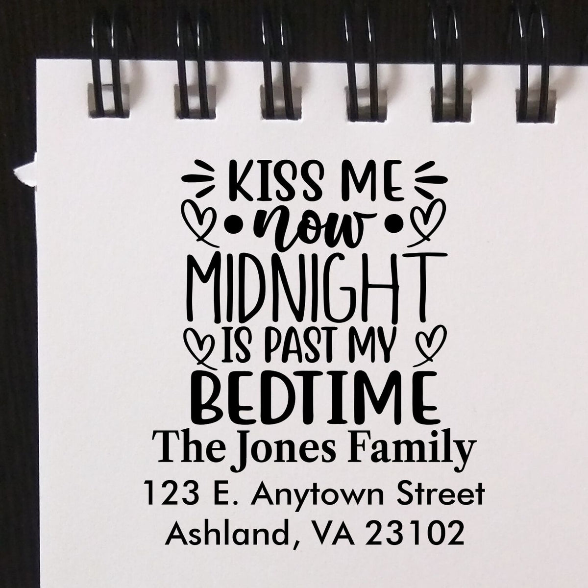Custom rubber stamp with Kiss Me Now Midnight Is Past My Bedtime and The Jones Family return address.