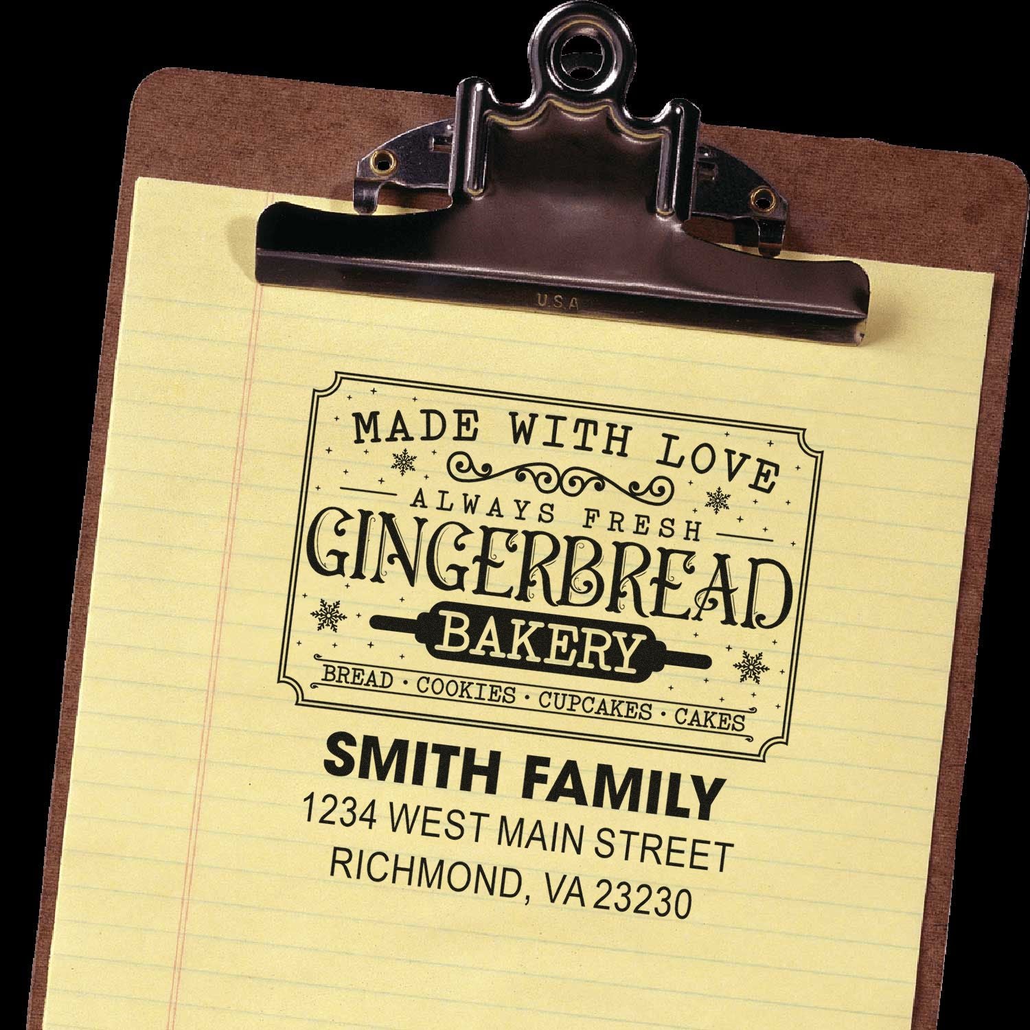 Personalized rubber stamp for bakery branding, featuring Made with Love gingerbread logo and Smith Family address.